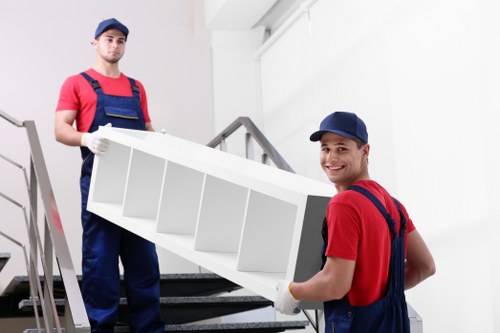 Moving team handling residential removals in Mordenpark with careful loading