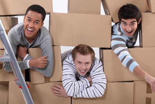 Packed boxes and furniture ready for removals in Mordenpark